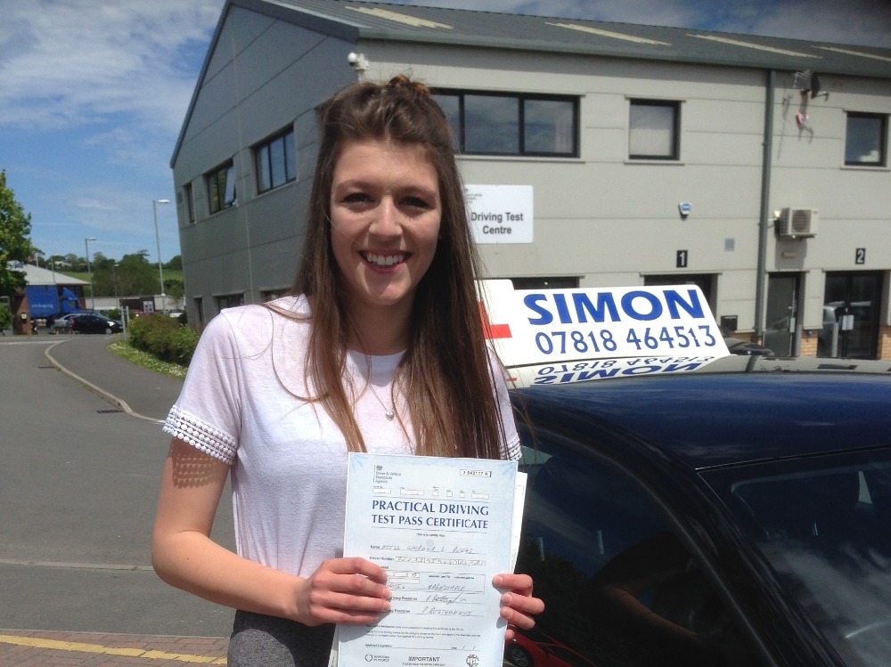 Young girl passed her driving test.