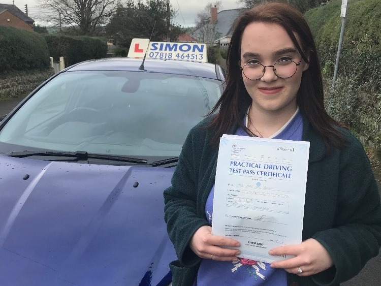 Young girl passed her driving test.
